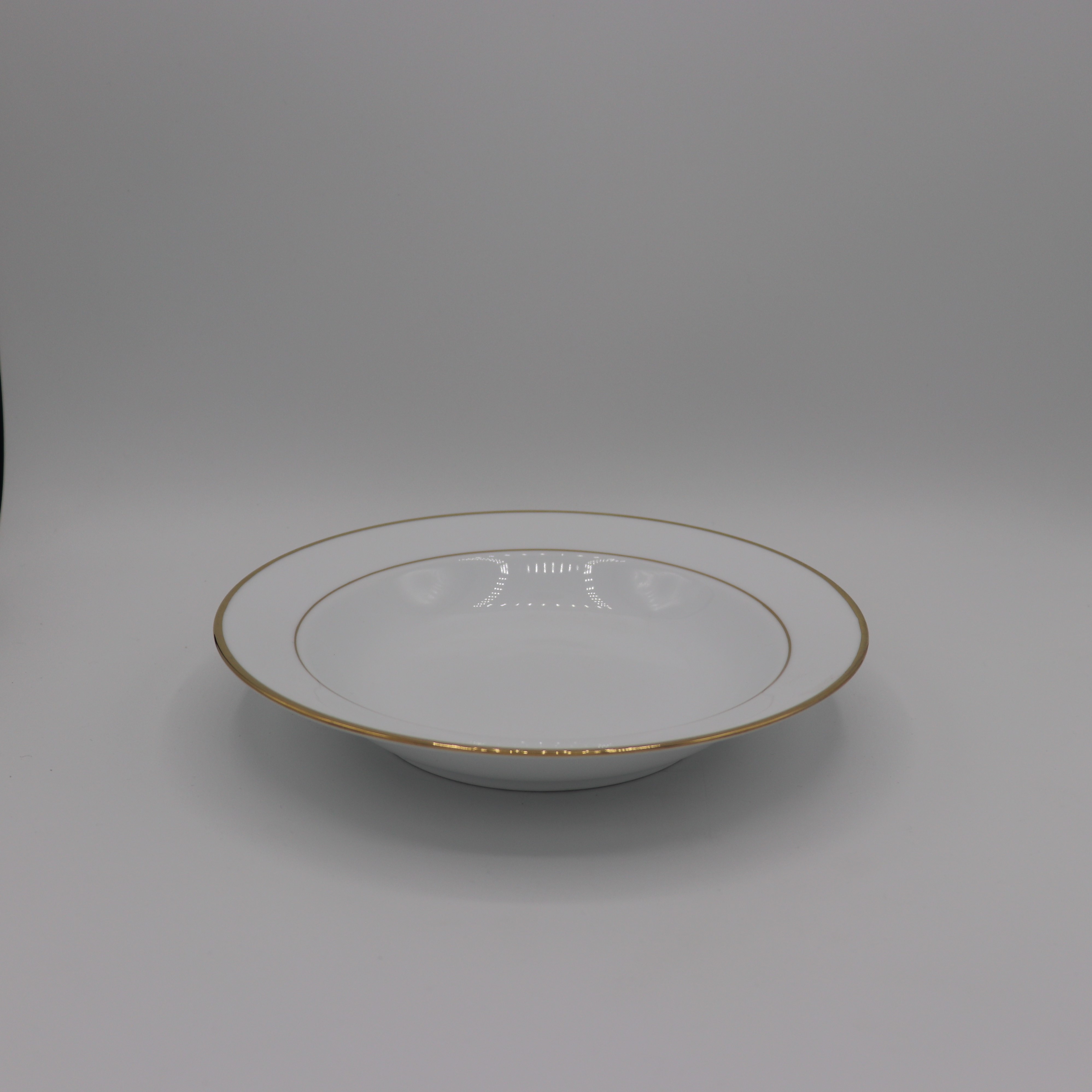 White cup and saucer with Silver Band Action Equipment & Event Rentals